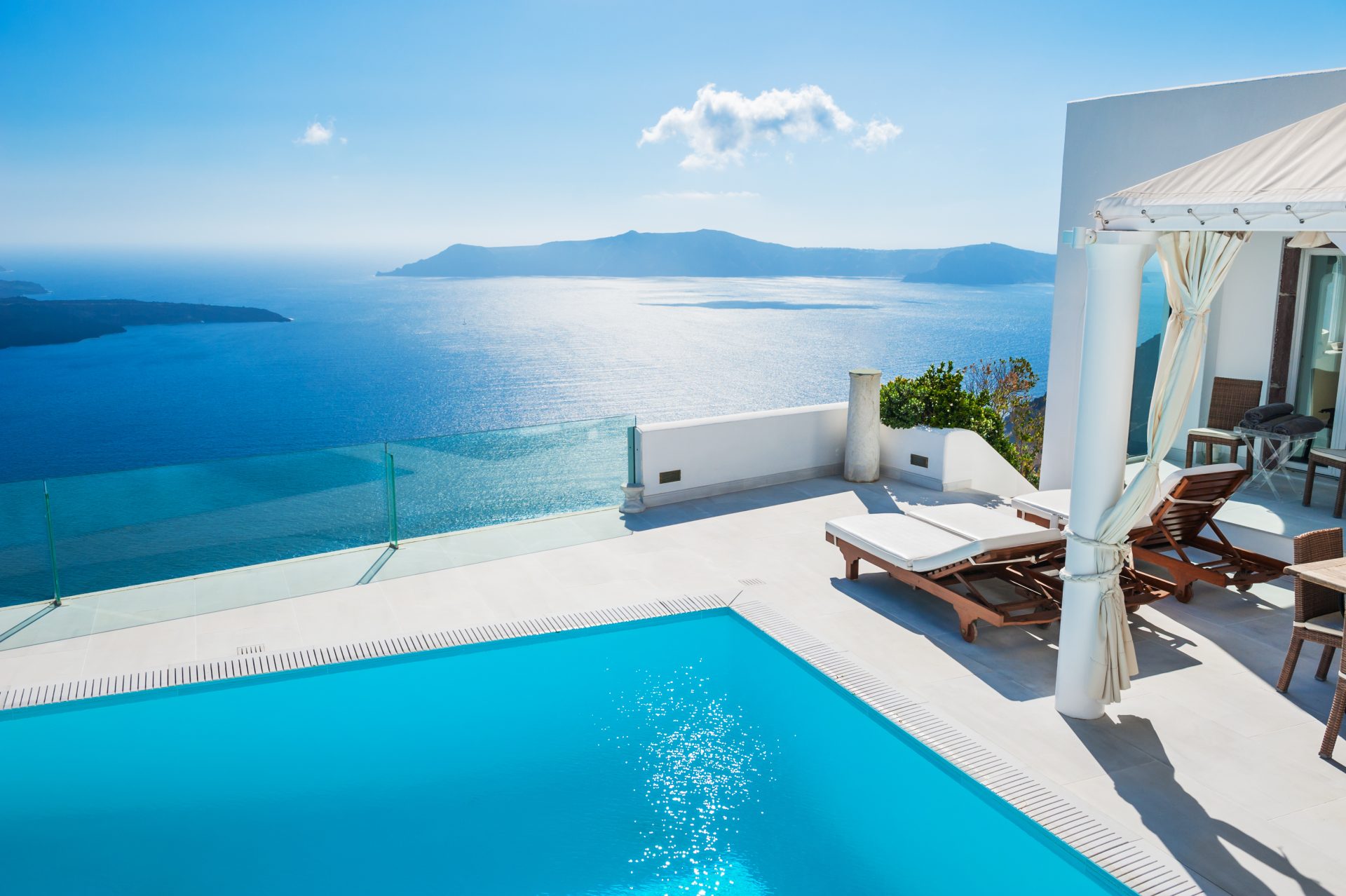 Image of a private pool, overlooking the ocean on a resort.